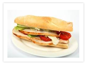 http://us.123rf.com/400wm/400/400/paulcowan/paulcowan0811/paulcowan081100016/3796550-a-baguette-submarine-bread-roll-filled-with-slices-of-turkey-lettuce-and-tomato-on-a-plate.jpg